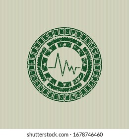 Green electrocardiogram icon inside distress rubber grunge stamp