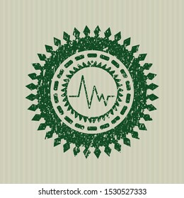 Green electrocardiogram icon inside distressed rubber seal