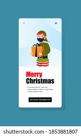 Green elf guy in uniform holding gift box male cartoon character Santa helper. Happy New Year and Merry Christmas background template. Modern website template mobile designs. Design concepts of web de