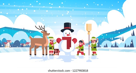 green elves group making snowman merry christmas happy new year banner flat horizontal vector illustration