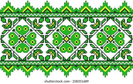 green embroidered good like handmade cross-stitch ethnic Ukraine pattern. spring color for St Patricks day