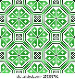 green embroidered good like handmade cross-stitch ethnic Ukraine pattern. spring color for St Patricks day