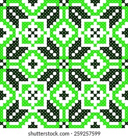 green embroidered good like handmade cross-stitch ethnic Ukraine pattern. spring color for St Patrick day