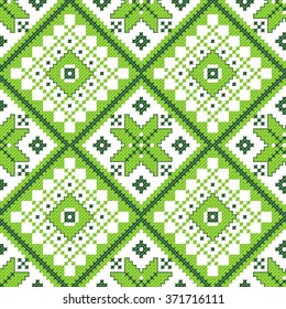 green embroidered good like handmade cross-stitch ethnic Ukraine pattern. spring color for St Patrick day