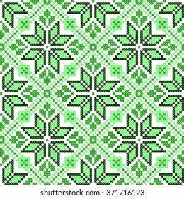 green embroidered good like handmade cross-stitch ethnic Ukraine pattern. spring color for St Patrick day