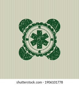 Green Emergency Cross Icon in Gummi Textur. 
