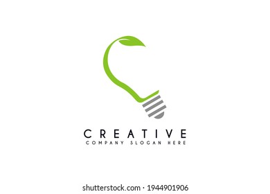 Green energy Leaf logo design with energy lamp icon, vector illustration
