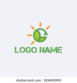 Green energy logo or icon vector design template with electric plugs and leaves