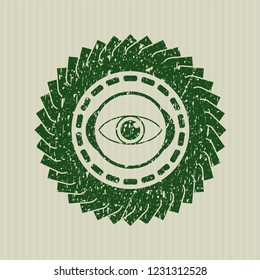 Green eye icon inside distressed rubber texture