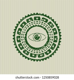 Green eye icon inside distressed grunge stamp