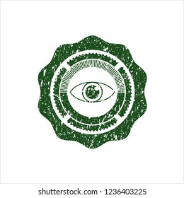 Green eye icon with rubber seal texture