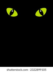 Green eyes of a cat on a blank black background.