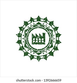 Green factory icon inside distress rubber grunge texture seal