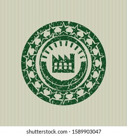Green factory icon inside rubber grunge seal
