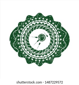 Green fertilization icon inside distress grunge style stamp