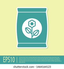 Green Fertilizer bag icon isolated on yellow background.  Vector Illustration