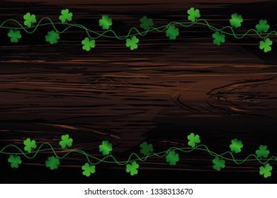 Green festive bunting with clover. Irish holiday - Happy St. Patrick's Day with garland of three-leaf. Greeting card, poster, banner. Vector on wooden background