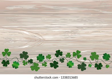 Green festive bunting with clover. Irish holiday - Happy St. Patrick's Day with garland of three-leaf. Greeting card, poster, banner. Vector on wooden background