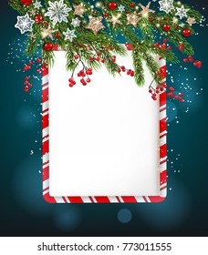 Green fir tree branches on blue background. Natural design elements. Winter snow background with Merry Christmas lettering