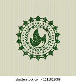 Green fire icon inside distress grunge stamp