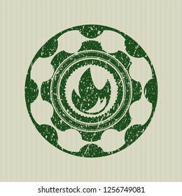  Green fire icon inside distress rubber grunge texture seal
