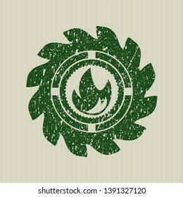 Green fire icon inside distressed grunge seal