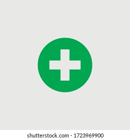 Green first aid sign isolated on white background
