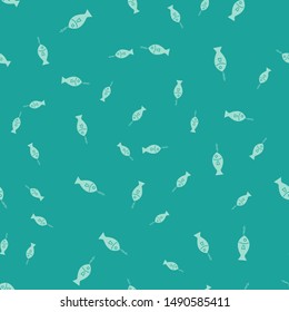 Green Fish on hook icon isolated seamless pattern on green background.  Vector Illustration
