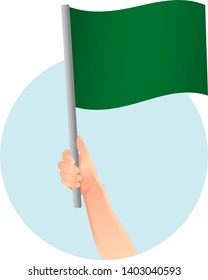 green flag in hand icon