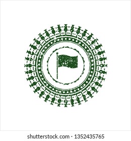 Green flag icon inside rubber grunge stamp