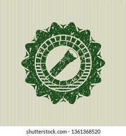 Green flashlight icon inside distressed rubber grunge texture seal