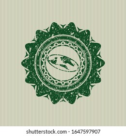 Green flat earth icon inside distressed grunge stamp