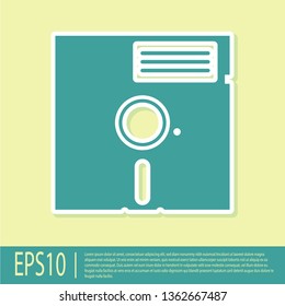 Green Floppy disk in the 5.25-inch icon isolated on yellow background. Floppy disk for computer data storage. Diskette sign. Flat design. Vector Illustration