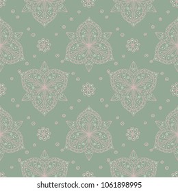 Green floral background. Seamless pattern with flower designs for wallpapers, textile and fabrics