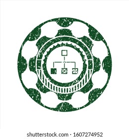 Green flowchart icon inside rubber grunge texture stamp