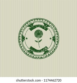 Green flower icon inside distressed grunge style stamp