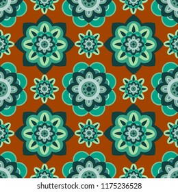 green flower on orange background