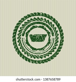 Green folder icon inside distress rubber stamp with grunge texture