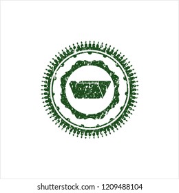 Green folder icon inside distressed rubber seal