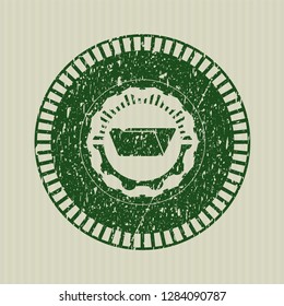 Green folder icon inside rubber grunge seal