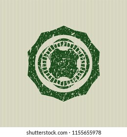 Green four leaf clover icon inside distress rubber texture