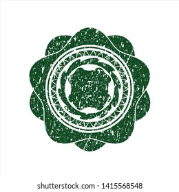 Green four leaf clover icon inside distressed rubber seal
