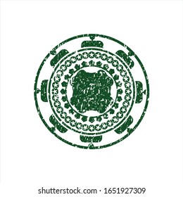 Icono verde de trébol de cuatro hojas dentro del sello de goma de la angustia con textura gruesa