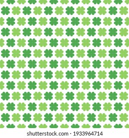 Grünes vierblättriges Kleeblatt mit nahtlosem Hintergrund. Shamrock Muster für Happy Saint Patrick's Day.