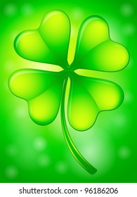 Green four leafs clover on a abstract background.