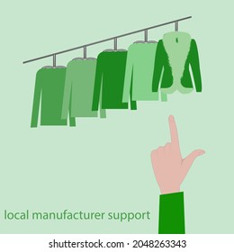 Green Friday - the finger of the hand shows a jumper, a jacket with a fur collar on hangers - vector Business concept. Support the movement of a local producer.