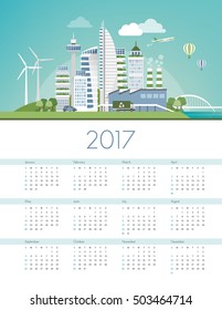 Green futuristic city skyline with wind turbines and solar panels, ecology and sustainability calendar 2017