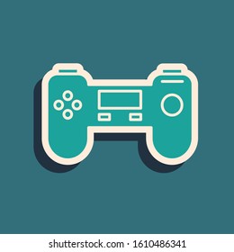 Green Gamepad icon isolated on blue background. Game controller. Long shadow style. Vector Illustration