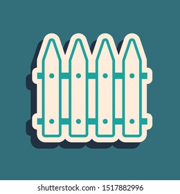 Green Garden fence wooden icon isolated on blue background. Long shadow style. Vector Illustration