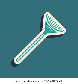 Green Garden rake for leaves icon isolated on blue background. Tool for horticulture, agriculture, farming. Ground cultivator. Long shadow style. Vector Illustration